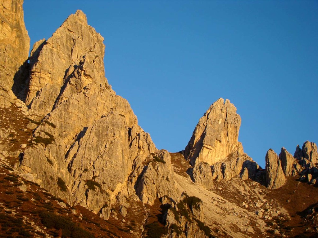 Il sorgere del sole illumina le torri Pian dei Buoi e San Lorenzo